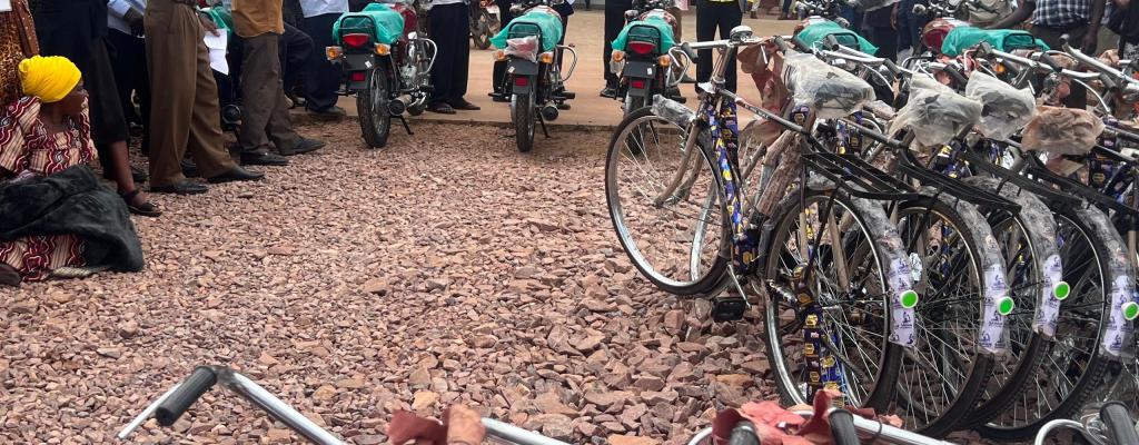 The District RDC, District Chairperson, DHO and KOFIH Delegates handing over 190 bicycles to VHTS and 10 motor cycles to VHT coordinators for the Community Health Workers project donated by KOFIH Motorcycles and Bicycles